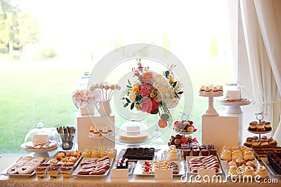 Table full with cakes and deserts Stock Photo