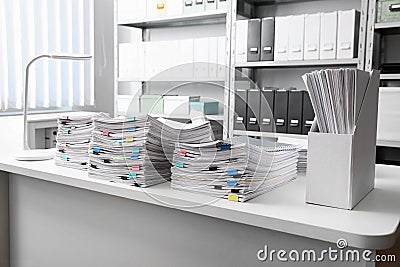 Table with lots of documents Stock Photo