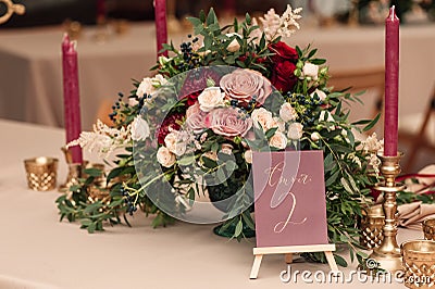 Table number and flower composition Stock Photo
