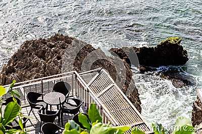 A table on a pier at a luxury coastal bar Stock Photo
