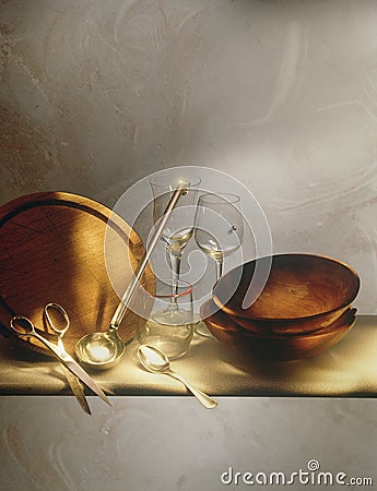 Table with plates, glasses, spoon and scissors Stock Photo
