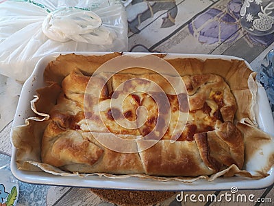 Table prepared with food cake satata speck and cherry tomatoes Stock Photo