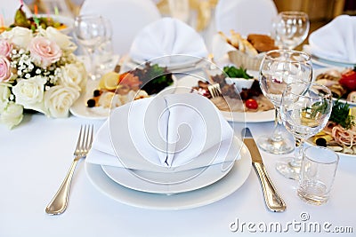 Table in a restaurant with wine glasses Stock Photo