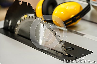 Table saw cutting wood , Circular saw blade for wood work .Carpenter tools Stock Photo