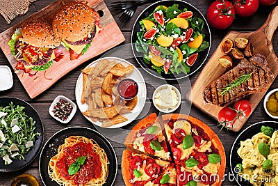 Table scene with assorted delicious foods Stock Photo