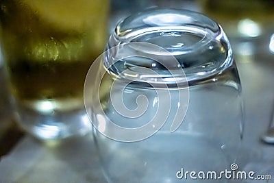 Table set up in a restaurant. narrow frame with objects that are usually found in a restaurant such as beverage glasses etc. Stock Photo