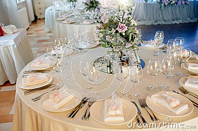 Table setting, festive round tables ready for guests Stock Photo