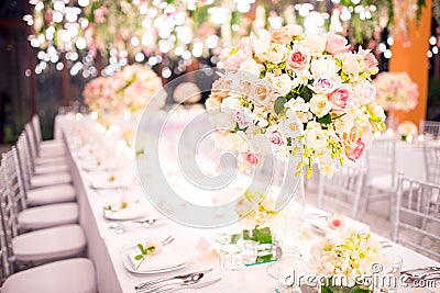 Table setting at a luxury wedding and Beautiful flowers Stock Photo