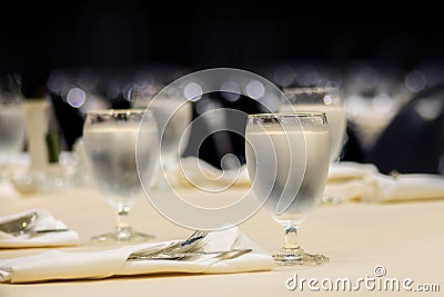 Table setting in the restaurant, water in the grass on the dinin Stock Photo
