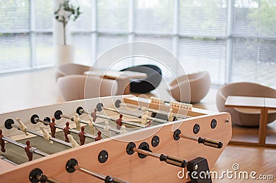 Table soccer in a large office room Stock Photo