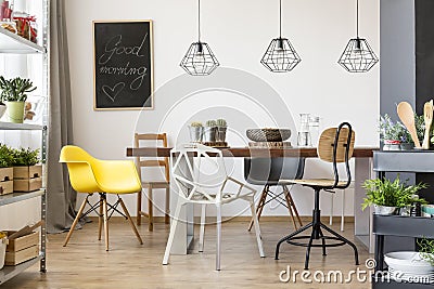 Table in spacious dining room Stock Photo