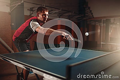 Table tennis, man playing game, ball with trace Stock Photo