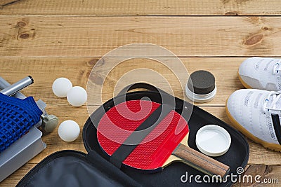 Table tennis paddle in open case with other mandatory equipment Stock Photo