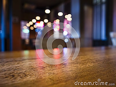 Table top Bar counter Blurred colourful lighting background Stock Photo