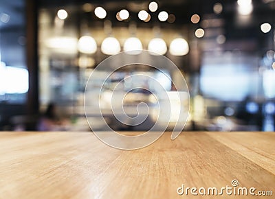 Table top with Blurred Bar restaurant cafe interior background Stock Photo