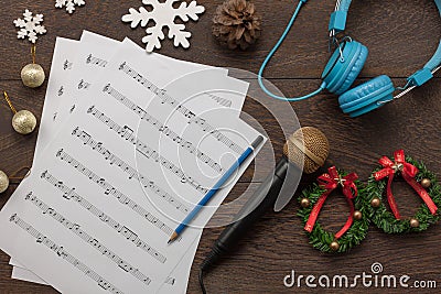 Table top view of music sheet note and accessories Merry Christmas & Happy new year concept. Stock Photo