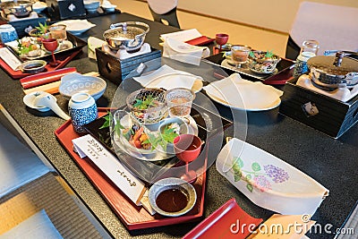 A table of traditional Japanese Kaiseki cuisine, prepared dishes Editorial Stock Photo
