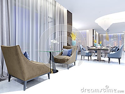 A table with two easy chairs in the contemporary lounge restaurant. Lighted comfortable space with large windows with evening Stock Photo