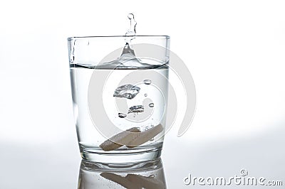 Tables dropping in water Stock Photo