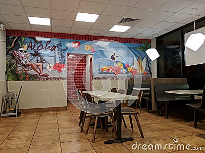 Tables and Hawaii Mural inside Jack in the Box Restaurant Editorial Stock Photo