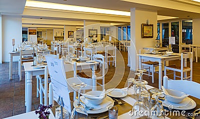 Tables in restaurant of the resort Europe, Greece, interior dining room for tourists Editorial Stock Photo