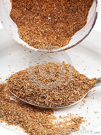 Tablespoon of wheat bran Stock Photo