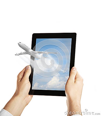 Tablet with airplane Stock Photo