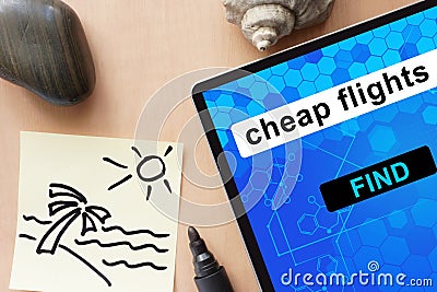 Tablet with cheap flights. Stock Photo