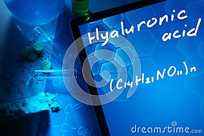 Tablet with the chemical formula of hyaluronic acid. Stock Photo