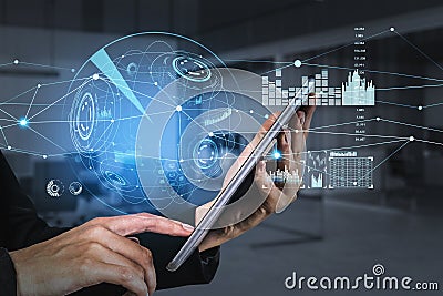 Tablet device in hands, businessman browse the Internet. HUDs with digital interface, information security and range of graphs and Stock Photo