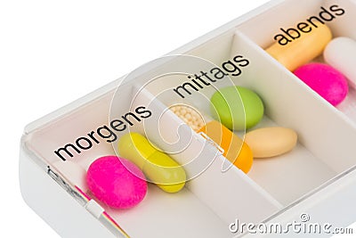 Tablet dispenser and tablets Stock Photo