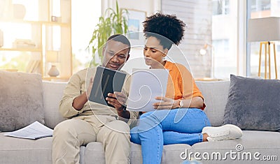 Tablet,documents, smile and couple on sofa in home living room, bonding and online shopping. Interracial, technology and Stock Photo