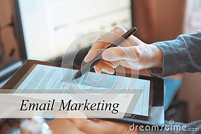 The tablet in the hands of a businessman. Email Marketing concept Stock Photo