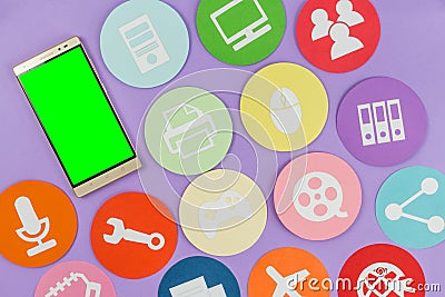 Tablet with icons made on paper, different applications Stock Photo