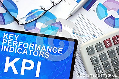 Tablet with Key Performance Indicators , KPI , graphs. Stock Photo