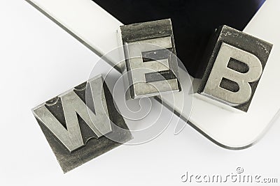 Tablet with old lead ink printing type letters Stock Photo