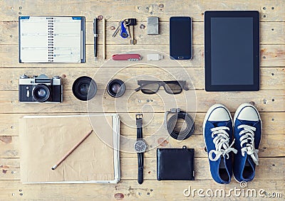 Tablet, phone, album, glasses, camera, lenses, gumshoes and watches Stock Photo