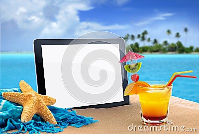 Tablet in the sand Stock Photo