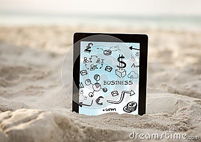 Tablet in sand showing black business doodles and sky Stock Photo