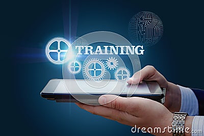 The tablet shows the inscription training. Stock Photo