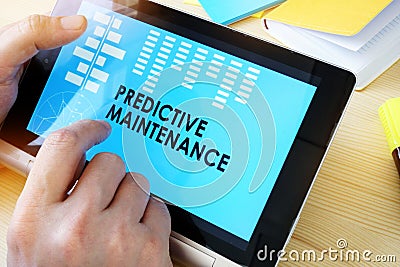 Tablet with title Predictive Maintenance. Stock Photo