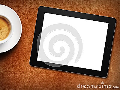 Tablet white screen similar to ipad display and coffee Stock Photo