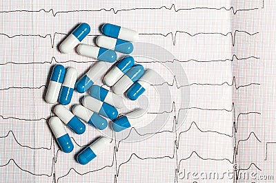 Tablets on the electrocardiogram Stock Photo