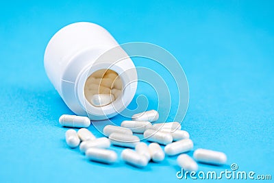 Tablets medicaments on a blue background Stock Photo