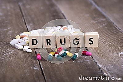 Tablets and narcotic addiction Stock Photo