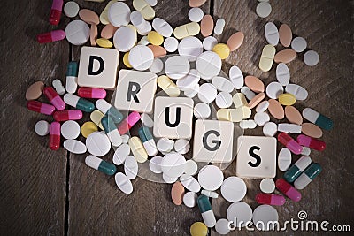 Tablets and narcotic addiction Stock Photo