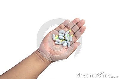 Tablets pills heap color mix medicine medical on hand Stock Photo