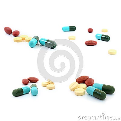 Tablets pills heap color mix therapy drugs doctor flu antibiotic Stock Photo