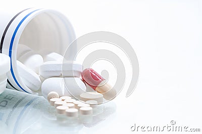 Tablets pills heap color mix therapy drugs Stock Photo