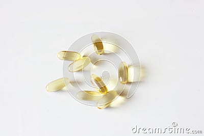 Tablets and pills laying on table. Stock Photo